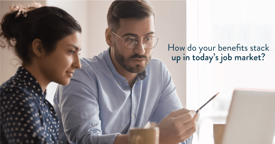 Young man and woman discussing benefits